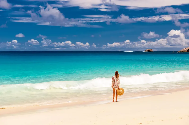 Orange Bay Hurghada - expansive white sandy beach, gently lapped by turquoise waves with clear views of the sparkling waters