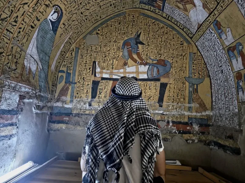 Preserved ancient village of Deir el-Medina where royal tomb builders lived, with decorated private tombs