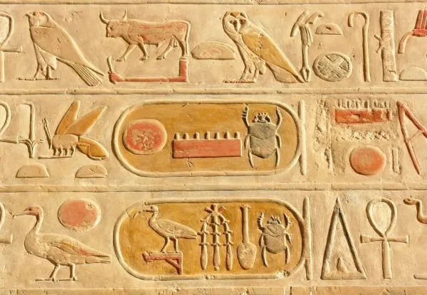 Egyptian Hieroglyphs on papyrus and stone carving