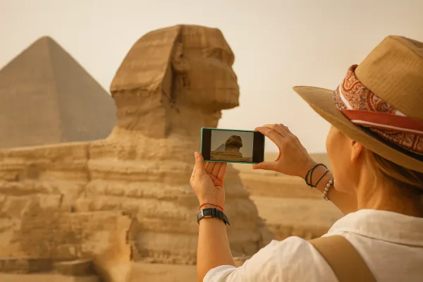 The Great Sphinx of Giza with pyramid in background