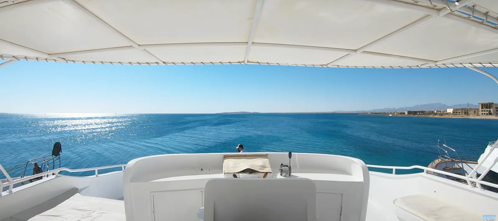 Glass-bottom boat tour to Orange Bay — vessel with underwater viewing areas