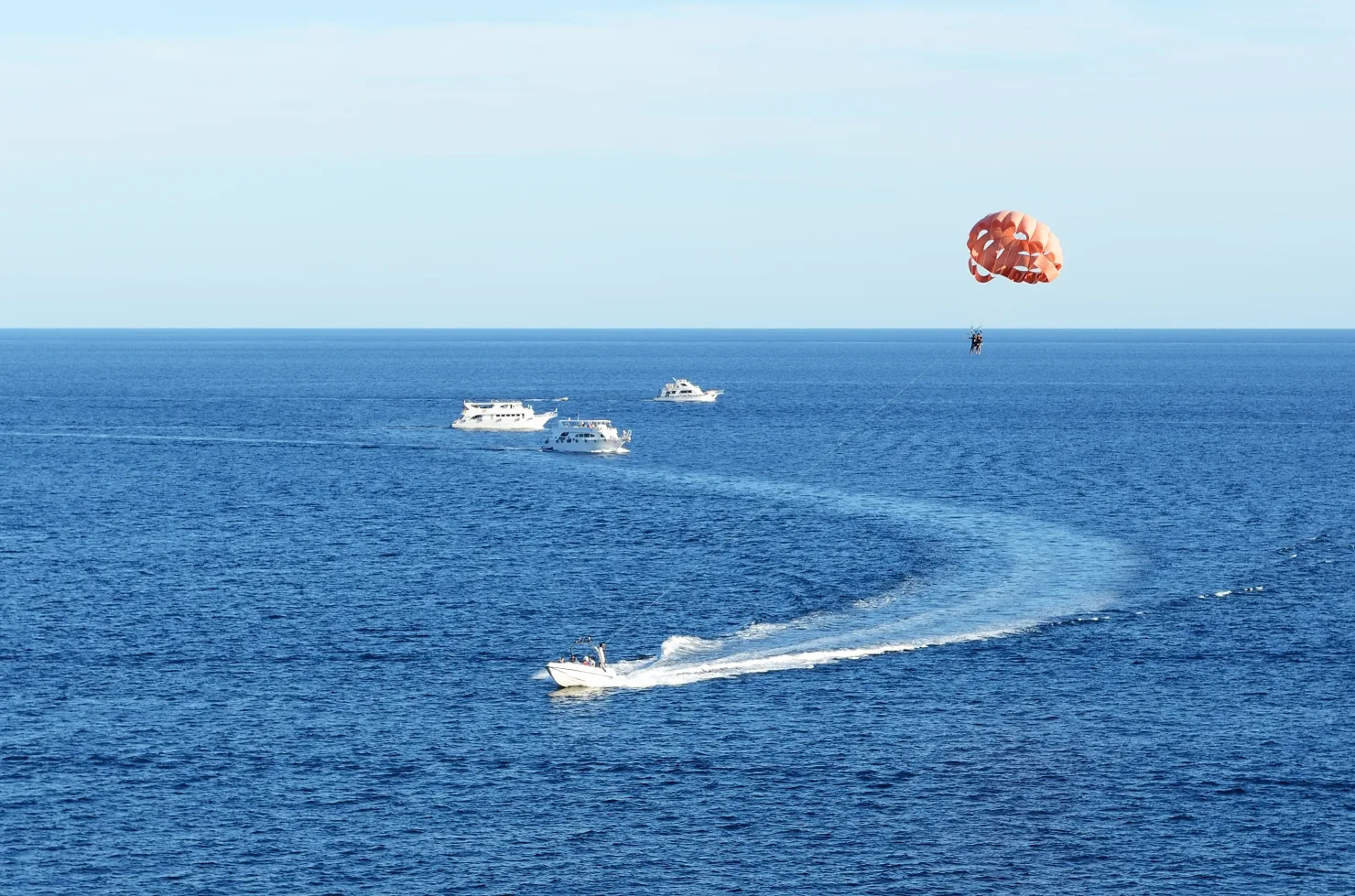 Hurghada: Glass Boat and Parasailing Trip with Snorkeling - Photo 3