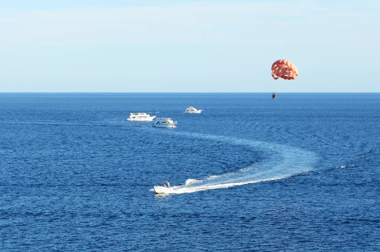 Hurghada: Glass Boat and Parasailing Trip with Snorkeling - Photo 3