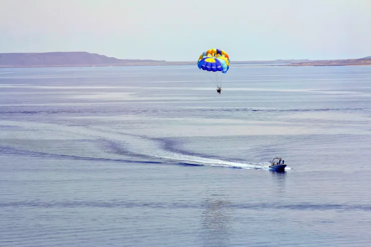 Hurghada: Glass Boat and Parasailing Trip with Snorkeling - Photo 5